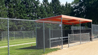 dg1030powdergirts_30-foot-team-dugout-with-orange-top_cedarburg-softball-5 -gallery