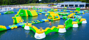 People on inflatable course.